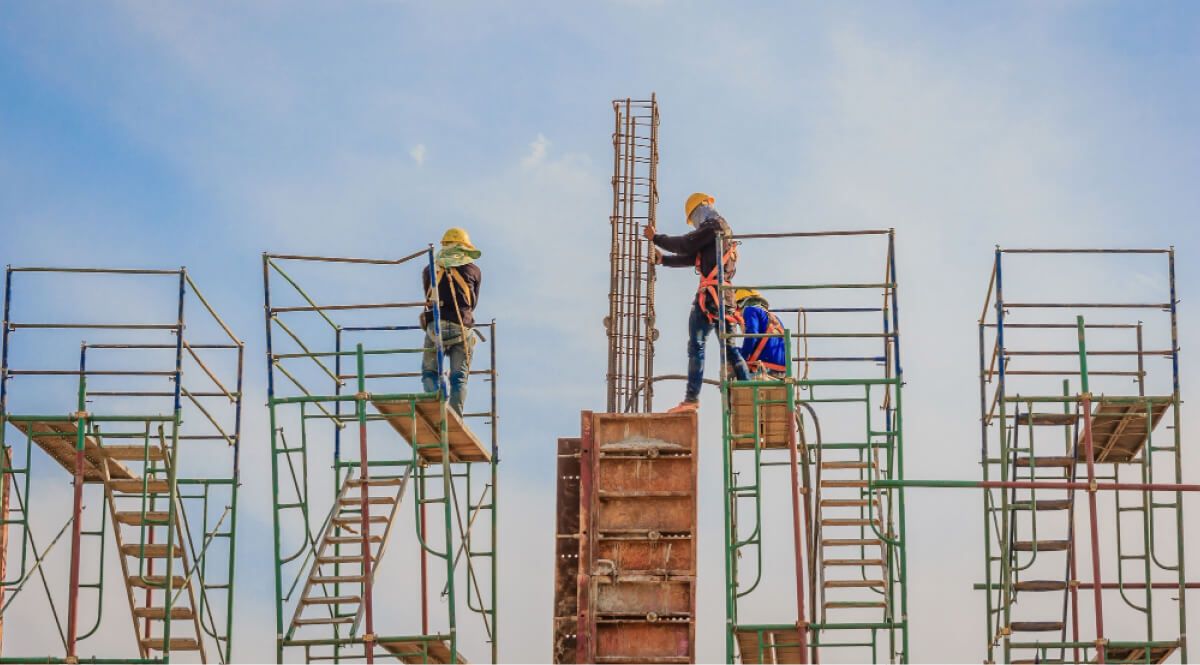 construction workers on a construction building