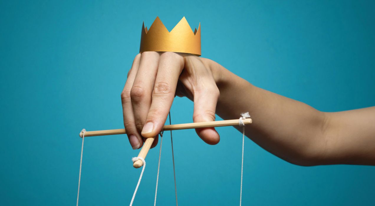 What is autocratic leadership style and how does it impact teams?