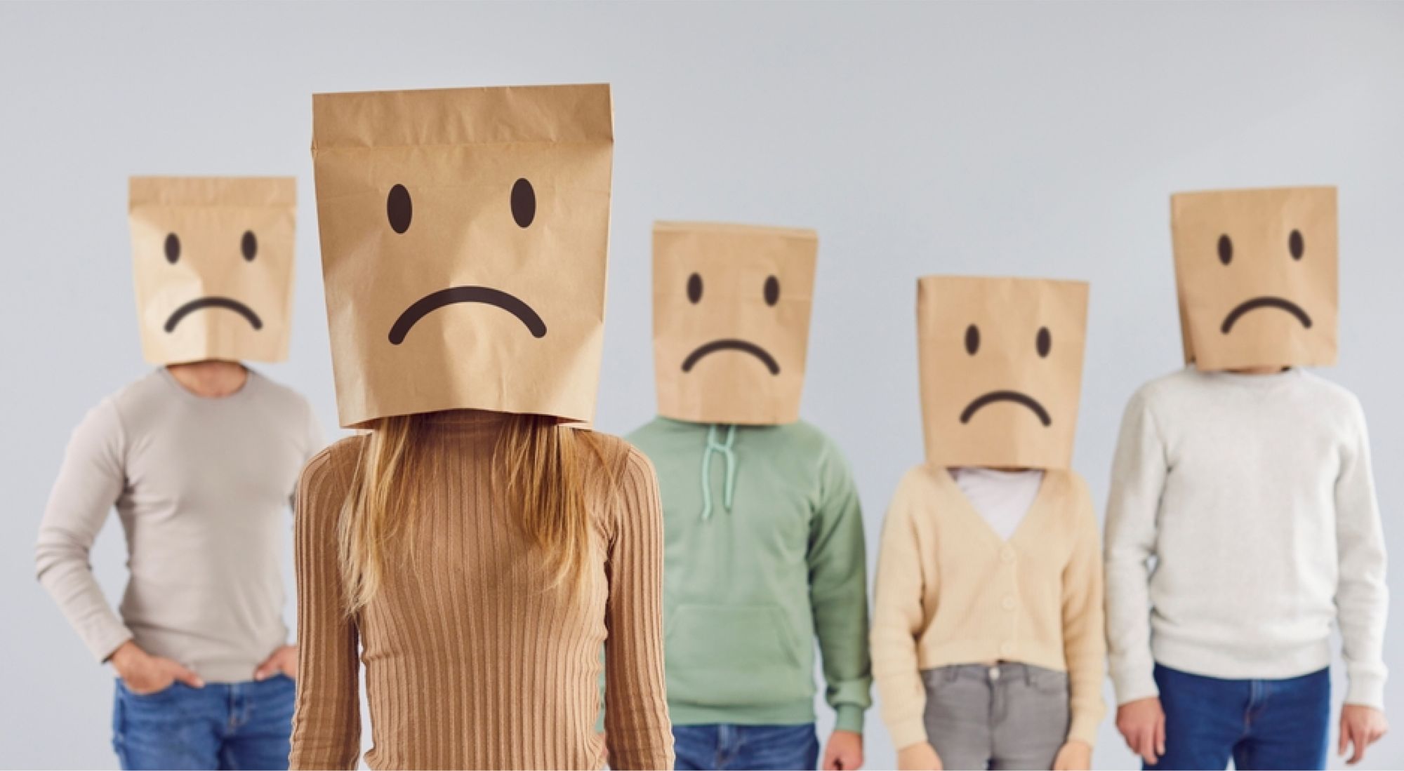 People with emoji paper bags in their head