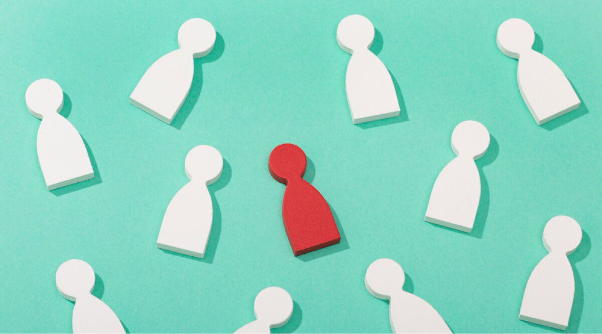 Wooden blocks with one red wooden block