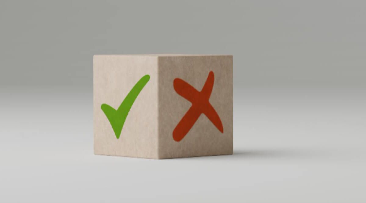 Wooden block with red wrong mark and green tick mark at two sides