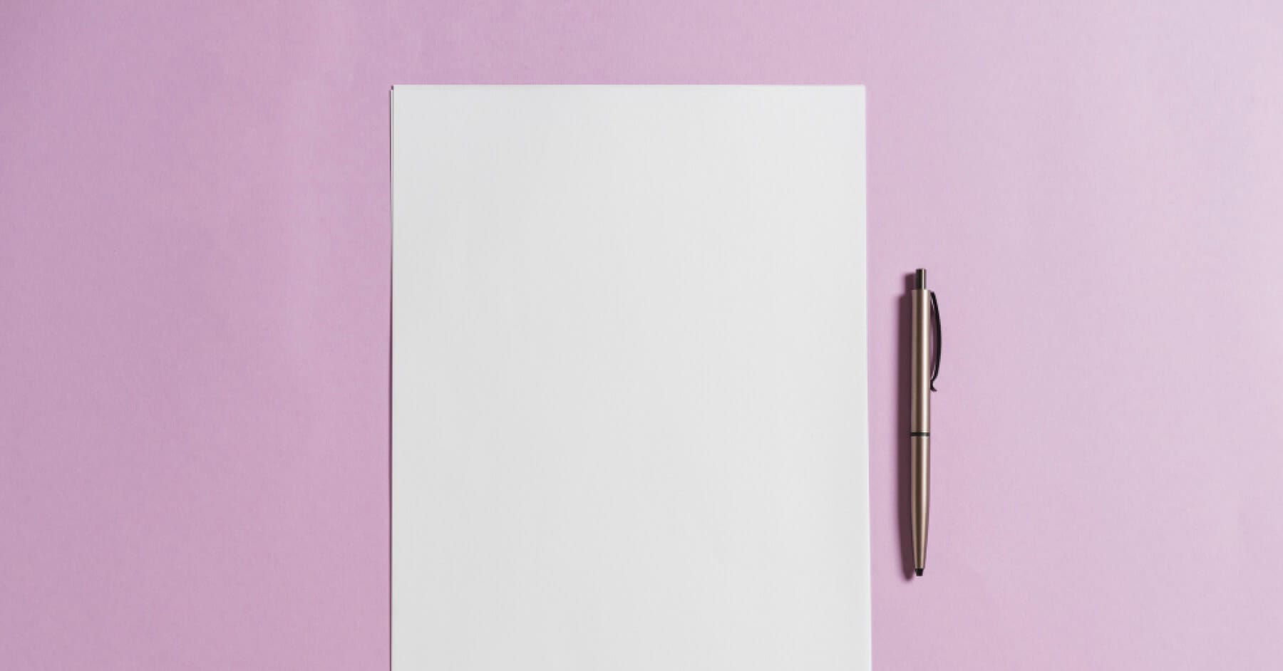 Blank one-page interview report template with a pen on pink background.
