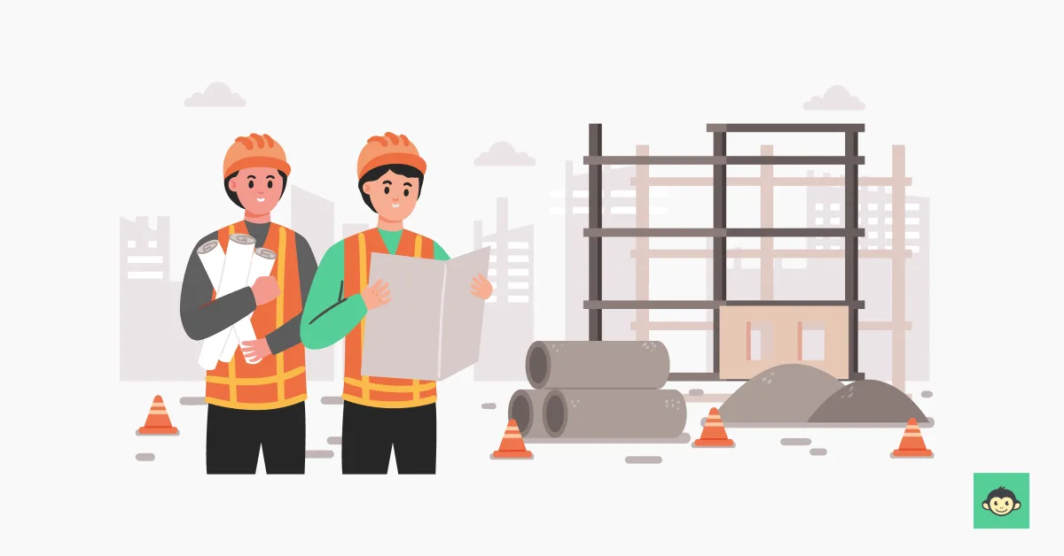 Two workers looking at the plan