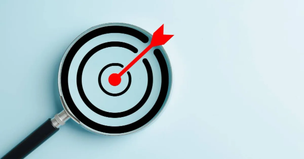 Magnifying glass over a vector target graphic