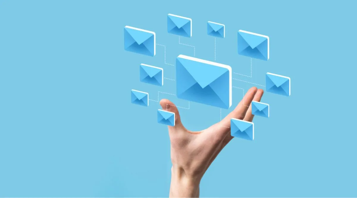 Mockup of a hand holding multiple blue images