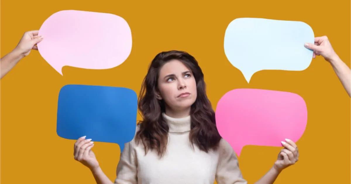 Employees holding different shapes of speech bubbles