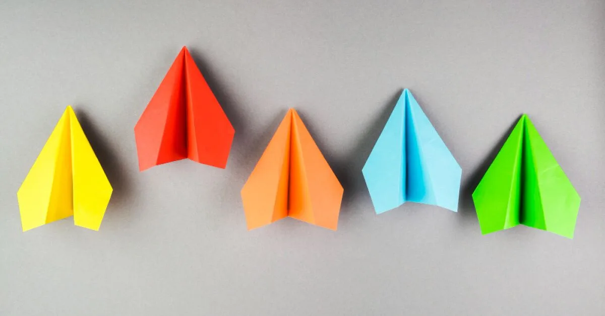 Paper planes in different colours