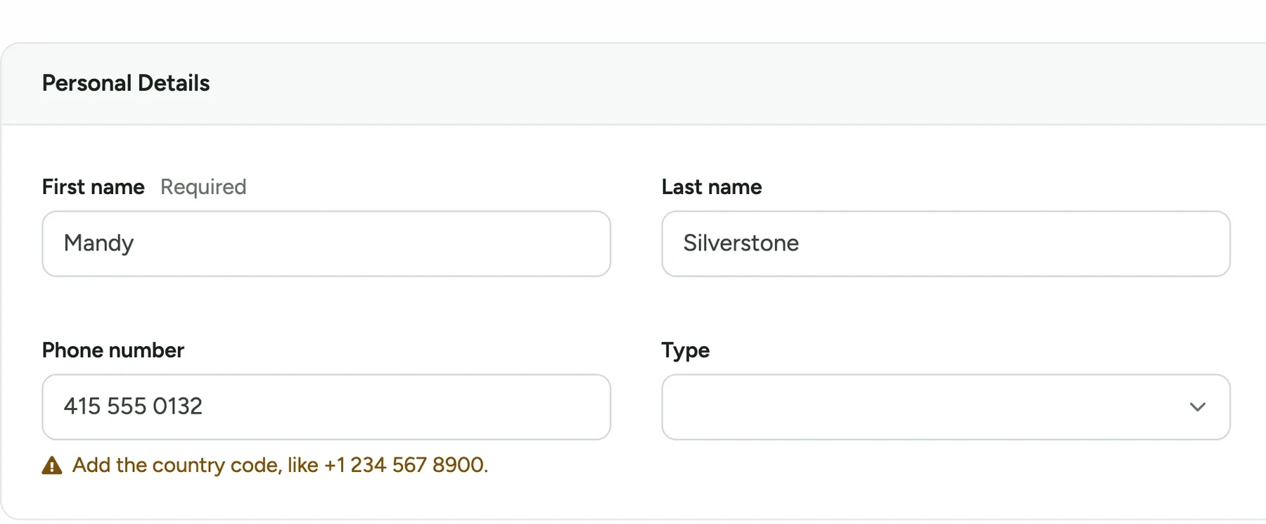 The employee form with the phone number 415 555 0132 and a warning under it reading 'Add the country code, like +1 234 567 8900.'